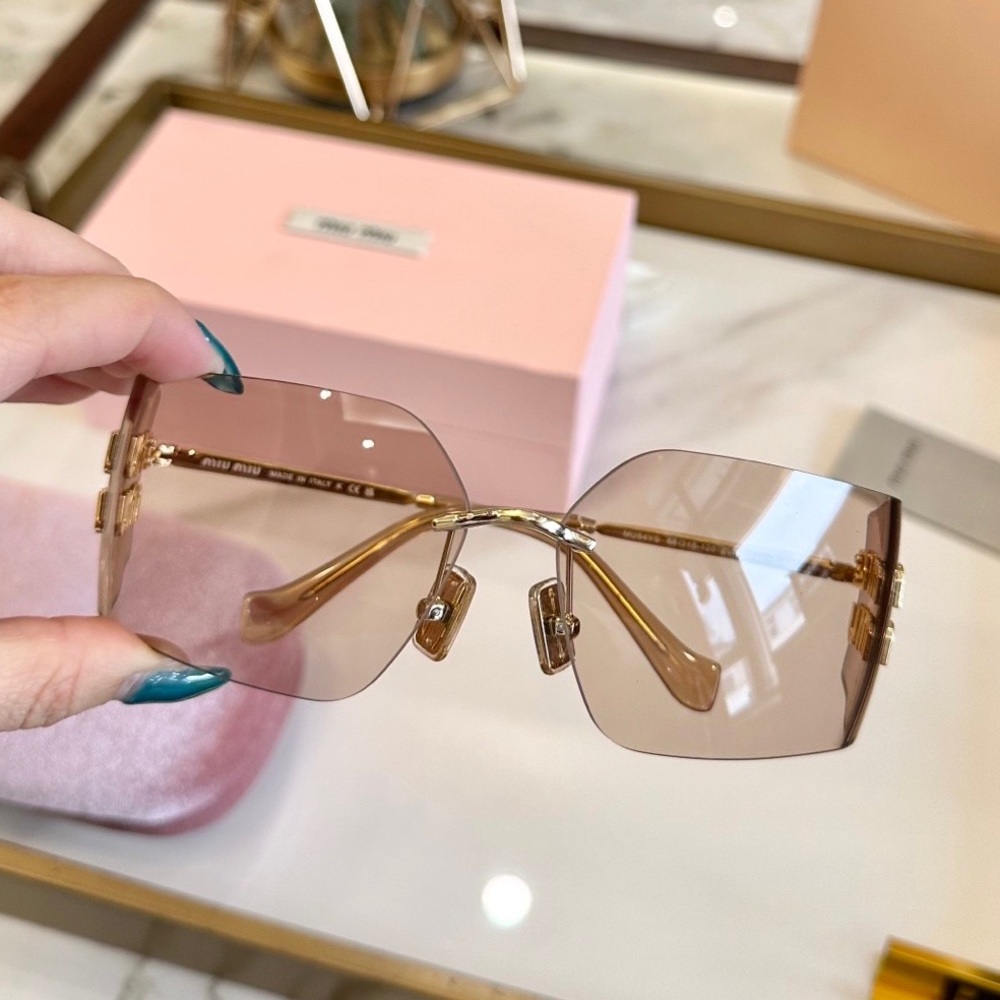 Miu Miu Rimless Sunglasses with Brown Gradient Lenses and Gold Accents